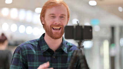 Redhead Blogger making Video on Smartphone, Blogging 