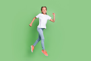 Fototapeta na wymiar Full length body size photo little girl jumping up running on sale isolated pastel green color background