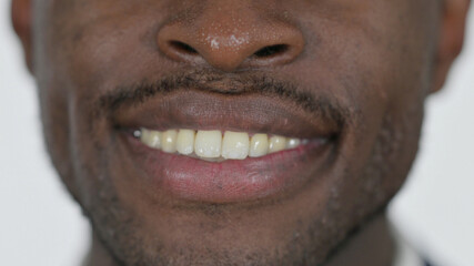 Obraz premium Close up of Smiling Lips of Young African Man