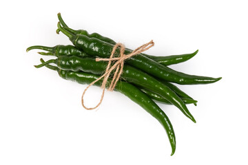 Bundle of the fresh green chili on a white background
