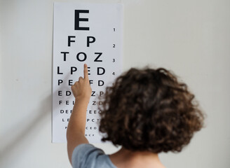 Young Caucasian girl getting an eye exam