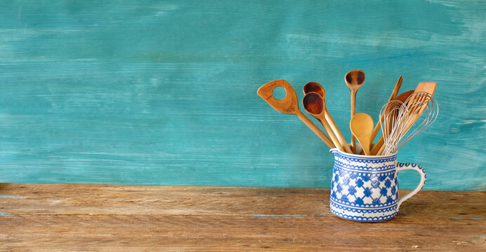 kitchen utensils in a decorated old mug, restaurant,cooking,food template,free copy space