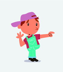 Surprised cartoon character of little boy on jeans points to something to his side.