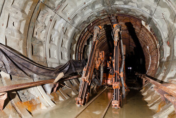 Subway tunnel construction. Deep metro line construction. Old mine for the construction of the subway