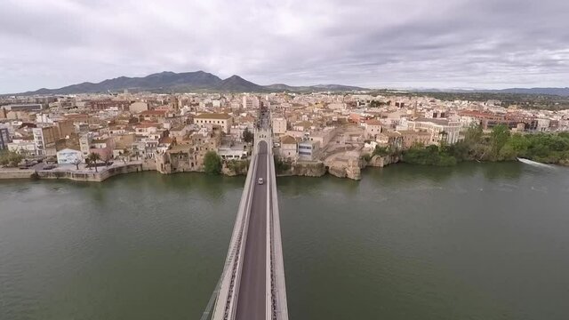 aerial views of the ebro river with boats and villages