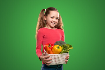 Cheerful child with assorted vegetables