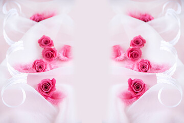 ホットピンクの羽根とプリザーブドのバラの合成