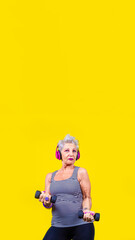 Confident senior caucasian woman training weight lifting isolated on copyspace background