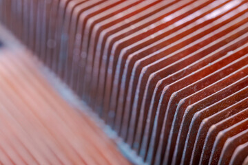 Copper radiator plates for a video card cooling system. Abstract metal shapes.