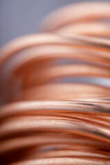 Copper wire non-ferrous metals, product metalworking industry. Abstract metal shapes.