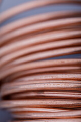Copper wire non-ferrous metals, product metalworking industry. Abstract metal shapes.
