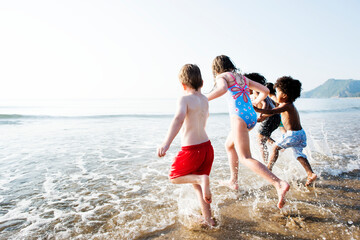 Children having fun on the beach