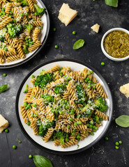 Green peas, broccoli pasta with pesto sauce and parmesan cheese. healthy food.