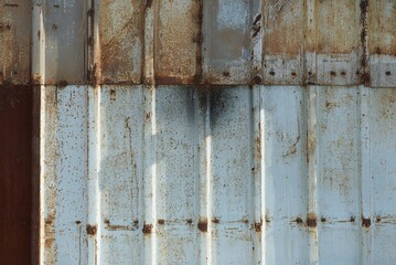 gray brown metal background from rusty  dirty old iron wall