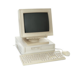 Old computer monitor, system unit, keyboard and mouse on white background