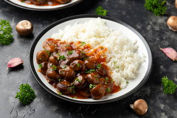 Mushrooms in Balsamic Soy rich sauce with rice. healthy vegan food.