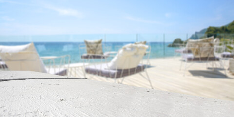 Obraz premium White wooden desk of free space and summer landscape of beach 