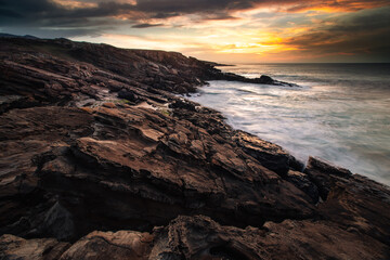 Sunset in the basque coast under Jaizkibel mountain in Hondarribia, Basque Country..