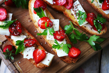 Delicious toast with strawberries and white cheese. Keto toast with strawberries.