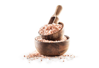 Himalayan pink salt in wooden bowl isolated on white background