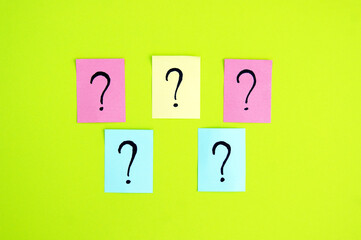 There are many question marks on the stickers.