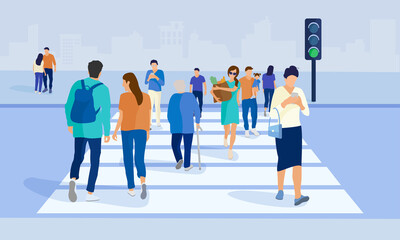 Crowd crosswalk. Crowd of people at the crosswalk. Women and men rush to cross the street along a pedestrian crossing against the backdrop of a cityscape with buildings and traffic lights. © Mary