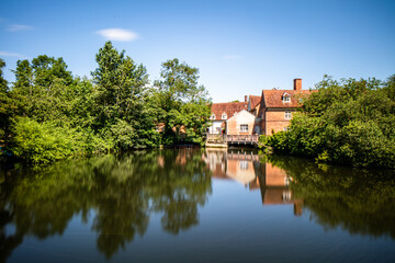 Fototapeta na wymiar A grade 1 listed water mill on river Stour, built in 1733.