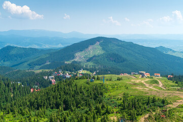 Naklejka na ściany i meble Panoramic view of the Dragobrat resort in Ukraine and the Carpathian mountains