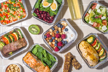 Healthy catering menu, courier food delivery lunch boxes. Beef steak meat, chicken filet , fish and vegetables in packages. Daily meal diet plan delivery , take away containers, online order concept