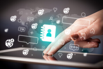 Close-up of a hand using tablet, social media concept