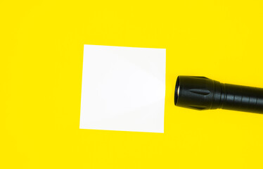 Blank white To Do List Sticker with black flashlight. Searching information on the Internet..Close...