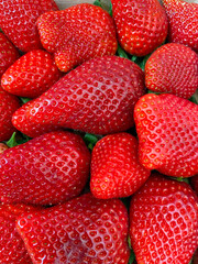 Full frame of huge and fresh strawberries
