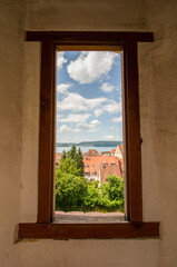 View through the window of a tower over the roofs of the medieval town Ueberlingen at Lake Constance, Germany