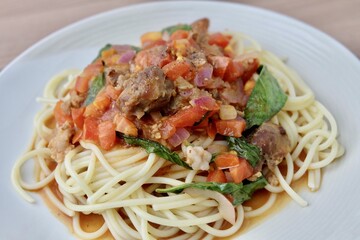 Closeup Spaghetti with Pork, Tomato and Sweet Basil