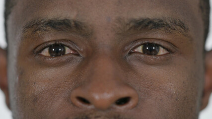 Close up of Blinking Eyes of Young African Man