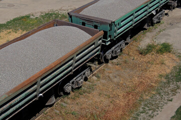 Open Freight Carriages Laden Of Crushed Stones