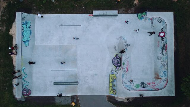 Grey skatepark with concrete graffiti top view