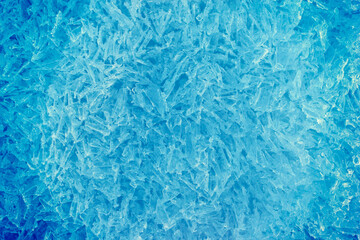Cool blue background of frozen ice crystals.