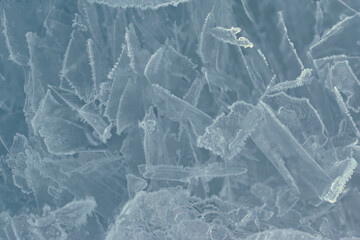 Winter theme background of frozen ice crystals.