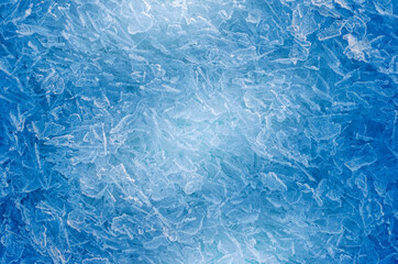 Cool blue winter theme background of frozen ice crystals.