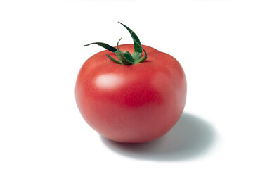 Raspberry Lyanna tomato isolated on white background with shadow.