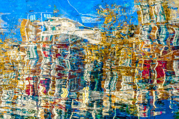 Colorful illustration of the buildings reflection along the canal in Amsterdam in the autumn