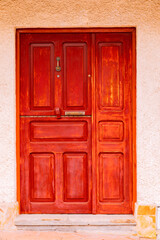 Fototapeta na wymiar Vintage wooden red door