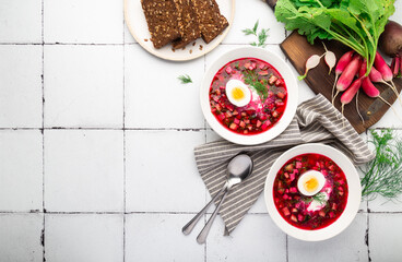 Summer cold beetroot soup with sour cream and egg