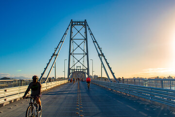 sunset on the bridge of Florianópolis Island and Hercílio Luz Bridge, Santa Catarina, Brazil, florianopolis