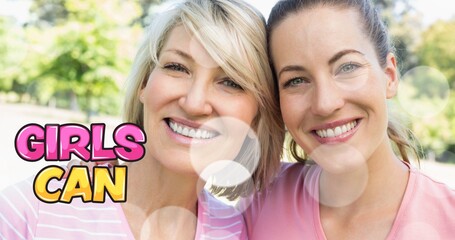 Composition of girl power text over group of two women smiling