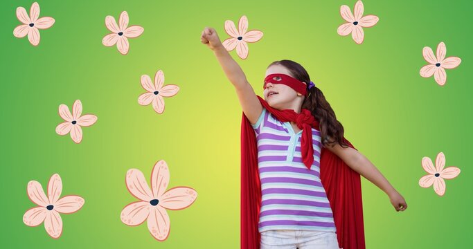 Composition of flowers over girl in superhero costume