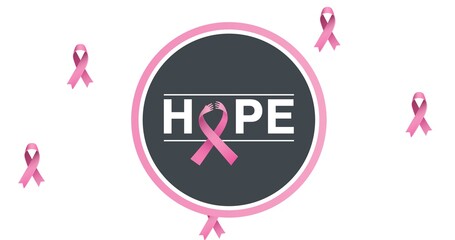 Composition of pink breast cancer ribbon on white background