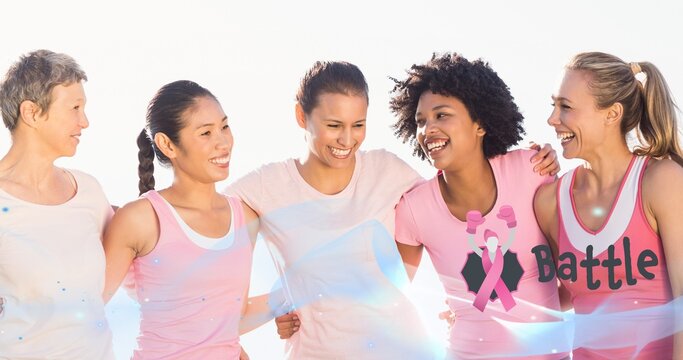Composition of pink breast cancer ribbon over group of smiling women