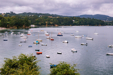 Panoramic view with sailor boats near a small village